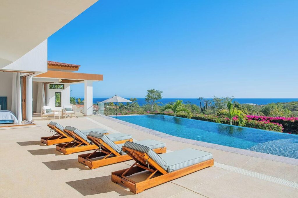 Los Cabos Villas Del Mar At Del Mar, homes are designed to feel calm, comfortable, and deeply personal. Each residence reflects the family who lives there—never a one-size-fits-all approach.Estate Villa 495 was thoughtfully tailored to embrace Cabo's natural rhythm and indoor-outdoor way of living. A complete redesign of the sun-filled pool deck brought new life to the home while preserving the memories already made. Set cliffside, just one row off the beach, the setting feels peaceful and expansive, where ocean air and open – 187 Padre Sistiaga, San Jose del Cabo, BS