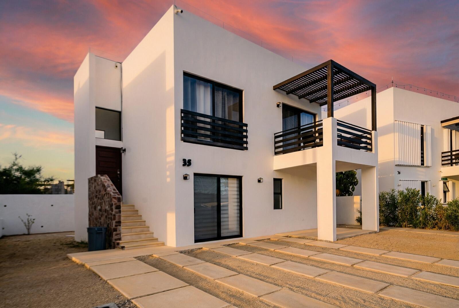Los Cabos Santa Rosa Strategic Investment in El Zacatal: Dual-Unit Property with High ROI PotentialLocated just one block from the main Blvd. Dr. Ernesto Chánez Chávez, this property is a prime opportunity in one of San José del Cabo's high-demand rental markets. The building features two independent, spacious units designed for modern living.Unit A (2 Bedrooms): A generous layout ideal for small families or professionals. It features a full kitchen with a functional breakfast bar and a complete bathroom.Unit B (1 Bedroom): A cozy, efficient unit perfect for couples or individuals. Includes a kitchen with a built-in bar and a full bathroom. for sale