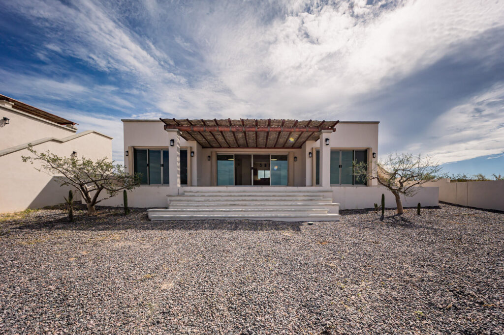 Los Cabos Villas Del Mar At Del Mar, homes are designed to feel calm, comfortable, and deeply personal. Each residence reflects the family who lives there—never a one-size-fits-all approach.Estate Villa 495 was thoughtfully tailored to embrace Cabo's natural rhythm and indoor-outdoor way of living. A complete redesign of the sun-filled pool deck brought new life to the home while preserving the memories already made. Set cliffside, just one row off the beach, the setting feels peaceful and expansive, where ocean air and open – Lote 013 Manzana 145, Pacific, BS