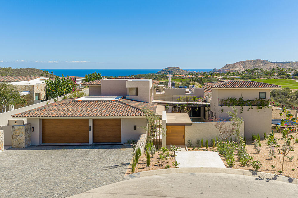 Los Cabos Blue Moon Located in the prestigious gated community of Pedregal, Villa De La Luz offers timeless Mexican Hacienda architecture combined with spacious living and exceptional comfort.This beautifully designed residence features expansive indoor and outdoor areas, ideal for both full-time living and entertaining. Bright interiors flow seamlessly to generous terraces, creating the perfect setting to enjoy Cabo's lifestyle.The home offers 6 en-suite bedrooms, a fully equipped kitchen, and thoughtfully designed living spaces. Outdoor amenities include a private swimming pool, jacuzzi, and BBQ area, providing an ideal environment for relaxation and gatherings.Include a two-car garage, ample storage, and access to Pedregal's exclusive amenities, including 24/7 security, beach and green areas. – Montaña 11, San Jose Corridor, San Jose Corridor, BS