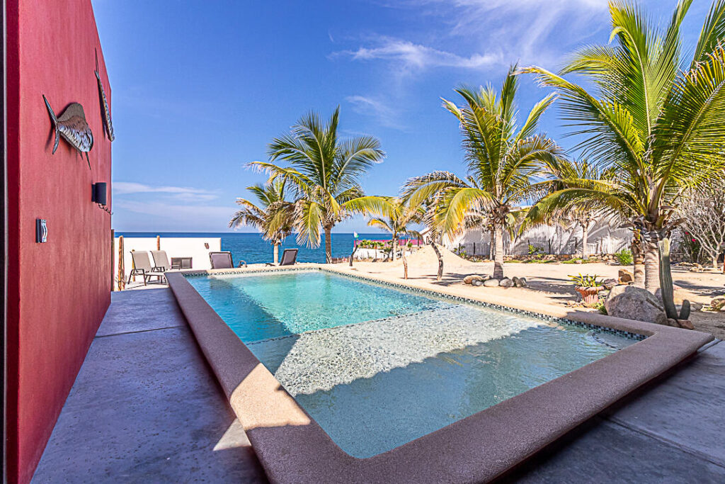 Los Cabos Fundadores Fully remodeled with entertaining in mind, Casa Reino is a stunning Spanish Colonial-style residence located within the double-gated Fundadores community of Puerto Los Cabos. Designed for hosting extended family and friends while maintaining exceptional privacy, this custom-built home blends timeless architecture with modern luxury and efficiency.An expansive pool terrace invites relaxed lounging under the renowned Los Cabos sunshine, complemented by shaded outdoor living and dining areas and multiple interior courtyards that provide privacy for guest suites. A brand-new bar, media, and entertainment room creates the perfect setting for dinner parties and special events.The thoughtful floor plan features a luxurious master suite with soaking tub and indoor/outdoor shower, along with four private guest suites, each positioned for comfort and seclusion. Modern upgrades throughout the home include all-new plumbing, air conditioning, doors, windows, lighting, and furnishings.Designed for efficiency and convenience, Casa Reino is equipped with a solar system, solar pool heater/chiller, and solar heat pump, keeping operating costs low. Additional highlights include an oversized two-car garage with commercial refrigerator and freezer, a new laundry room with dual washer/dryer sets, and a new BBQ cook center with wet bar, icemaker, and refrigeration. The pool has been newly refinished, exterior travertine decking installed, and a complete hurricane shutter system added.Residents of Puerto Los Cabos enjoy 27 holes of Nicklaus and Norman signature golf, with the option to transfer a golf membership at the purchaser's cost. Membership also includes access to tennis and pickleball courts. Fundadores HOA fees include exclusive access to the Fundadores Beach Club, featuring an oceanfront infinity pool, Jacuzzi, fitness center, event lawn, restaurant, and spa services.Ideally located just 5 minutes from the Puerto Los Cabos Marina, 10 minutes from downtown San José del Cabo, and 30 minutes from Los Cabos International Airport, Casa Reino offers effortless access to world-class dining, shopping, and lifestyle amenities.Special Features & UpgradesSolar system in placeSolar pool heater and chillerNewly remodeled pool with new finishesNew exterior travertine deckingNew bar / media / family roomNew laundry room with double washer & dryersNew air conditioning throughoutNew furnishingsNew kitchen appliances: refrigerator, two dishwashers, ice maker, beverage fridge & drawersNew sinks and faucets in kitchenSonos sound systemNew doors and windowsNew hurricane protection systemNew interior and exterior lightingCommercial refrigerator and freezer in garageNew countertops and cabinetry in kitchenette and bath at Guest Casita #4 – S/N Privada Los Jardines, Pacific, BS