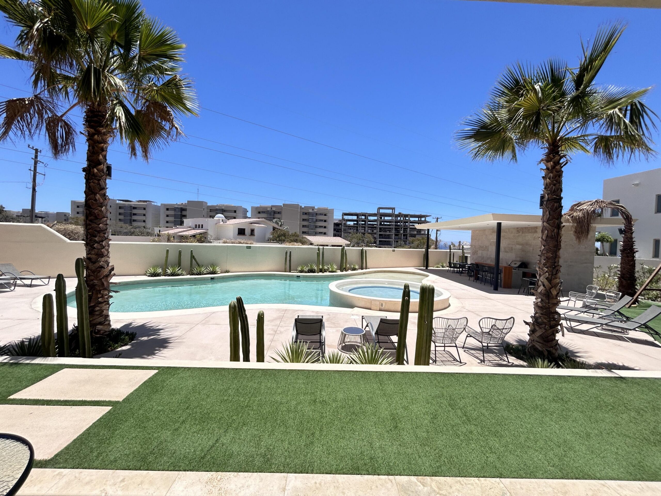 Los Cabos Cabo Costa POOL INCLUDED! This stunning 2-bedroom condo with huge deck is located on the first level in the Balandra Tower of Cabo Costa . Cabo Costa is the newest community that blends its arquitectural designs with nature. This unit has been meticulously designed and comprises two end-suite bedrooms. The property interior is designed in neutral tones to create a modern, welcoming and luxurious home yet retaining its original features. Amenities such as a Club House, Infinity pool, Gym, sundeck, Kids area, Jacuzzi, Wetbar, Snackbar & Massage area. – Lote 49 Isla dorada vista real desarro, Cabo Corridor, BS