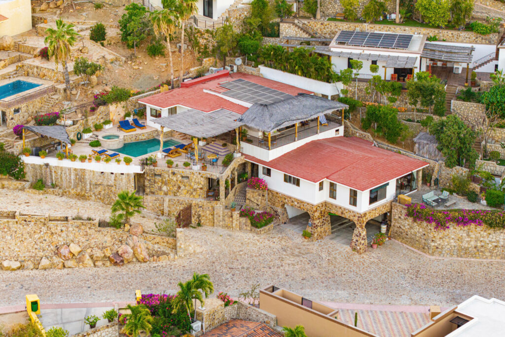 Los Cabos Pedregal Csl Villa Felicidad is a 5-bedroom, 5.5-bath residence in Pedregal that combines scale, location, and proven income potential. Set just minutes from the main gate and within walking distance to the marina, it offers effortless access to Cabo's best dining and nightlife while maintaining privacy. The home features a private pool, expansive terraces, and panoramic marina – Lote G y H Crispin Ceseña, Cabo Corridor, BS