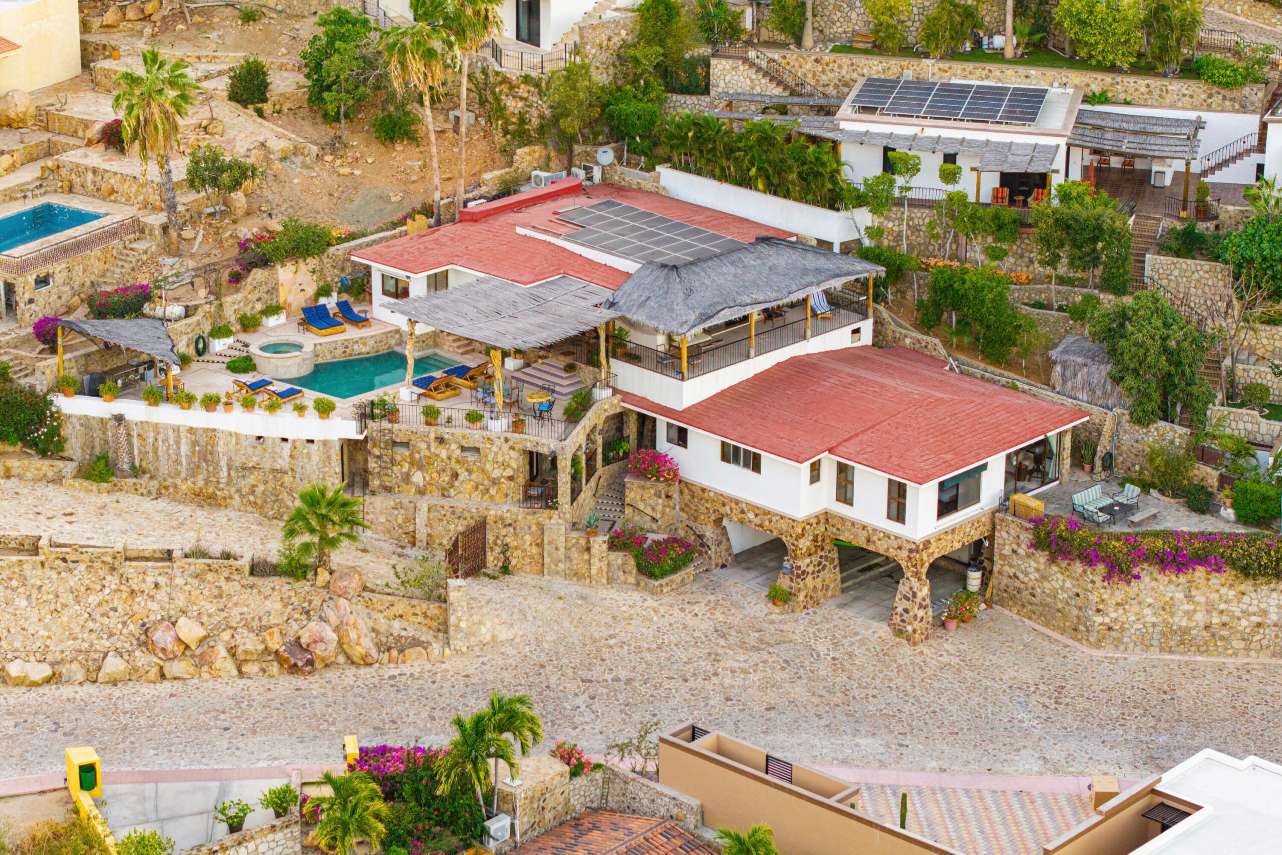 Los Cabos Pedregal Csl Villa Felicidad is a 5-bedroom, 5.5-bath residence in Pedregal that combines scale, location, and proven income potential. Set just minutes from the main gate and within walking distance to the marina, it offers effortless access to Cabo's best dining and nightlife while maintaining privacy. The home features a private pool, expansive terraces, and panoramic marina for sale