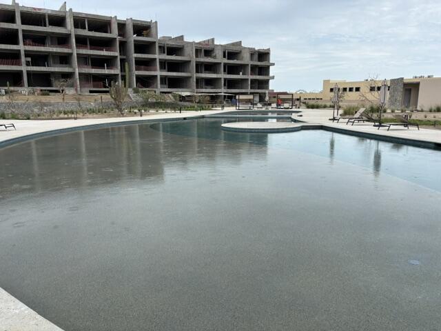 Los Cabos Lumaria Enjoy resort living within a private and gated community, Amenities include a resort style pool, large jacuzzi, state of the art gym, spa treatment rooms and a full-service cafe. This penthouse unit has a pergola for shade over your outdoor dining area, full counter area with a sink, propane hook up for outdoor grill, hook up for hot tub and perimeter lighting for nighttime use. Close to grocery store as well as Home Depot. Driving access to Costco without going on the highway. for sale